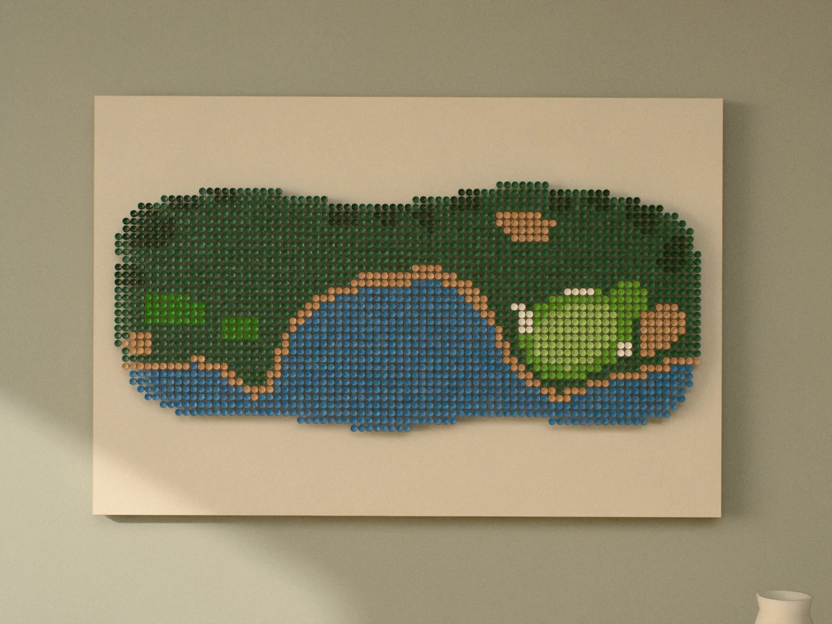 The whole piece straight on: a blue cove between two headlands, with sandy cliff edges, a green ringed by white bunkers on the right and two tee boxes on the left, on an ivory panel.