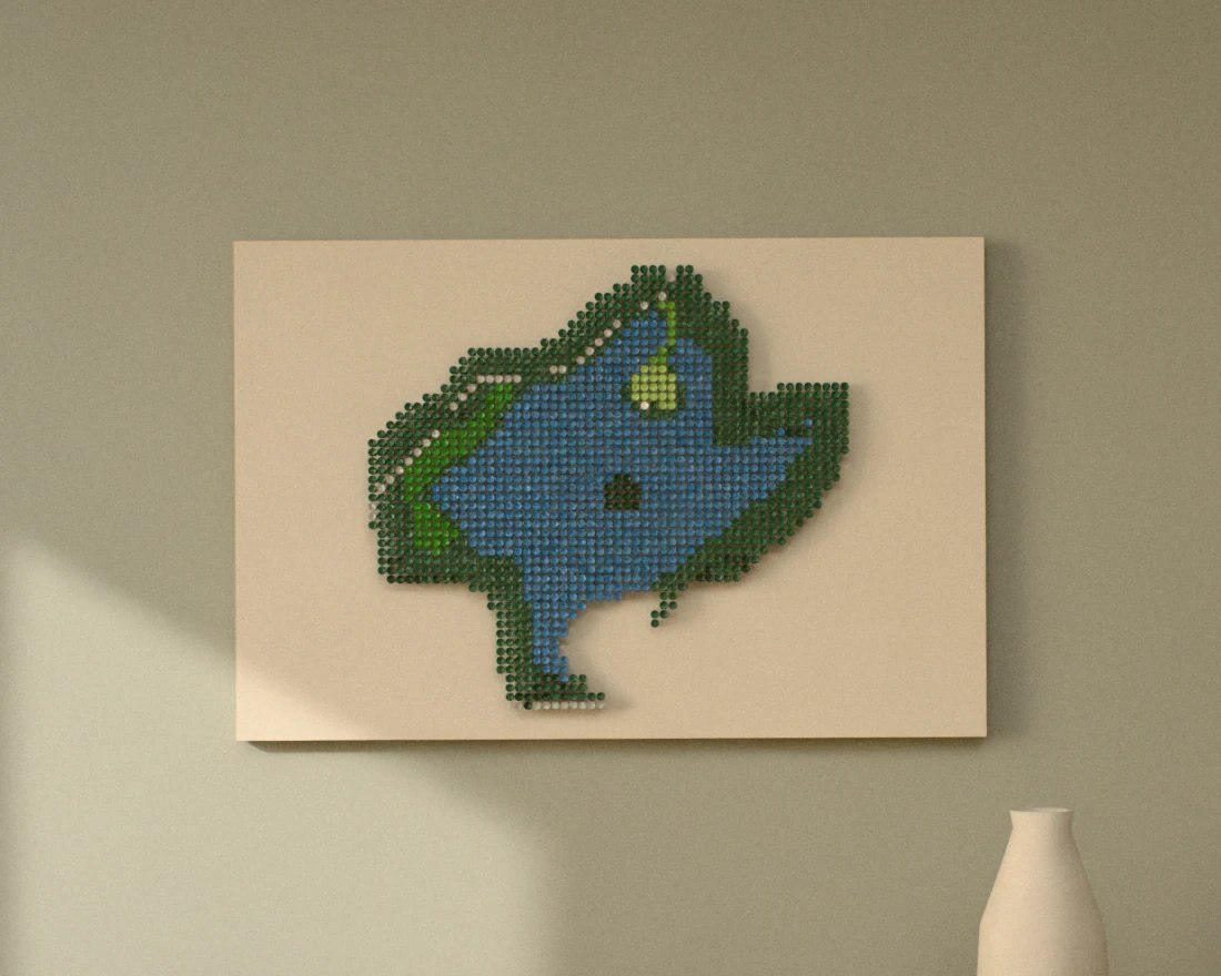 A golf-tee picture of a par 3 with a green surrounded by water, hung wide on a sage wall above a wooden sideboard with books and a vase.